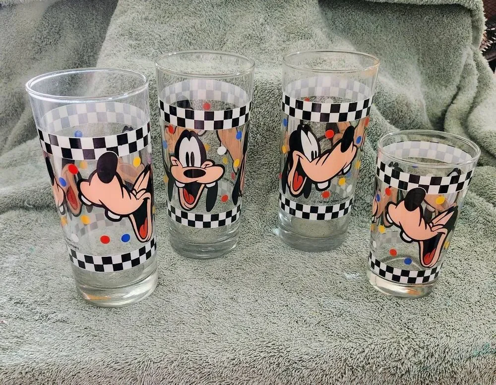 This is a set of vintage Goofy drinking glasses manufactured by Anchor Hocking f